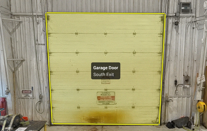 Outlined garage door with a Basic Text polyline label and description.